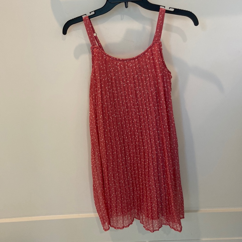 Pink flowy dress with white polka dots